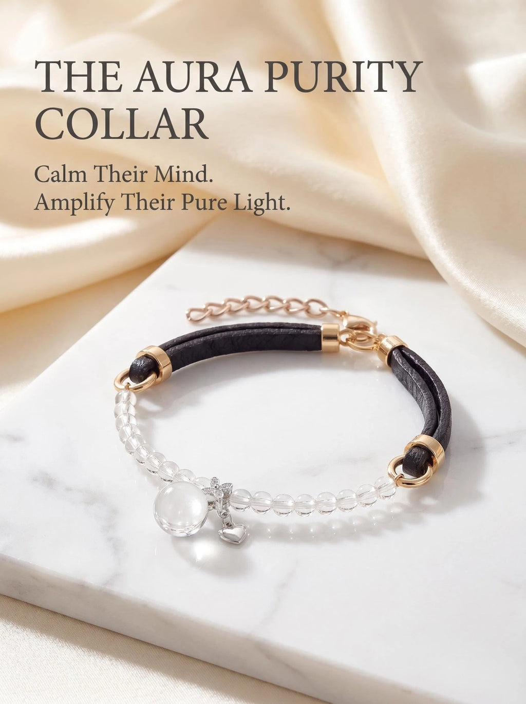 The Crystal Familiar clear quartz pet collar 
with black leather cord rose gold hardware 
crystal sphere heart and butterfly charms, 
luxury crystal cat and small dog collar 
on white silk surface