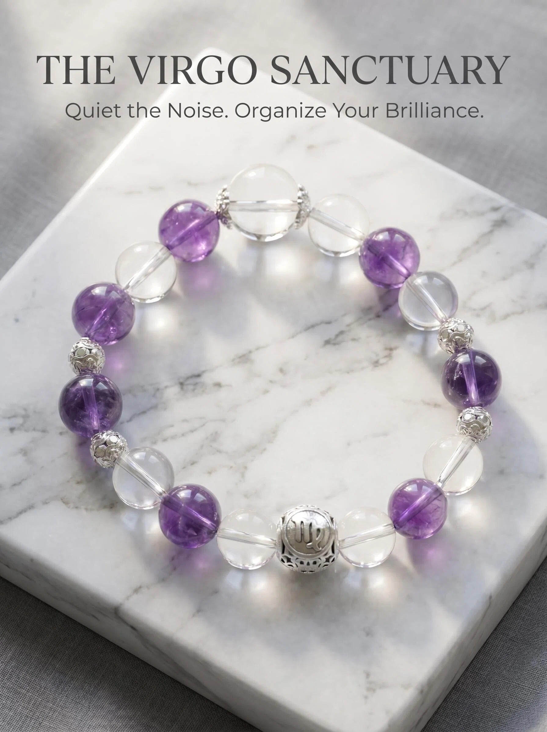 The Virgo Oracle crystal bracelet 
with amethyst and clear quartz beads, 
Virgo zodiac healing jewelry on white marble surface, 
minimalist luxury crystal bracelet