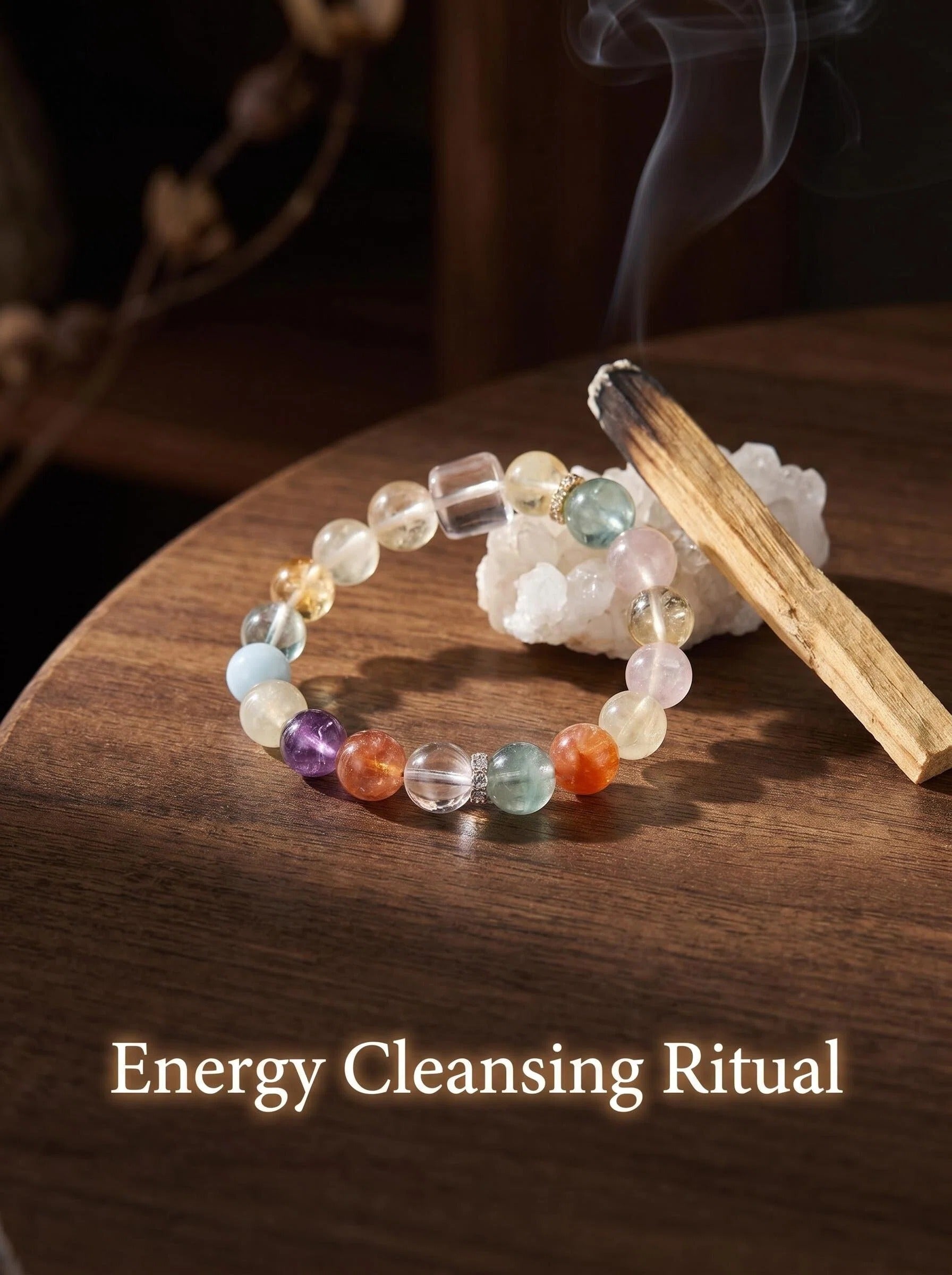 Full Bloom 7-stone crystal bracelet on selenite charging plate
with white sage bundle and clear quartz cluster,
complete chakra bracelet cleansing ritual