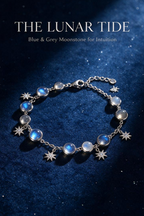 Blue and grey moonstone bracelet called The Lunar Tide, laid on dark navy velvet under moonlight-style lighting