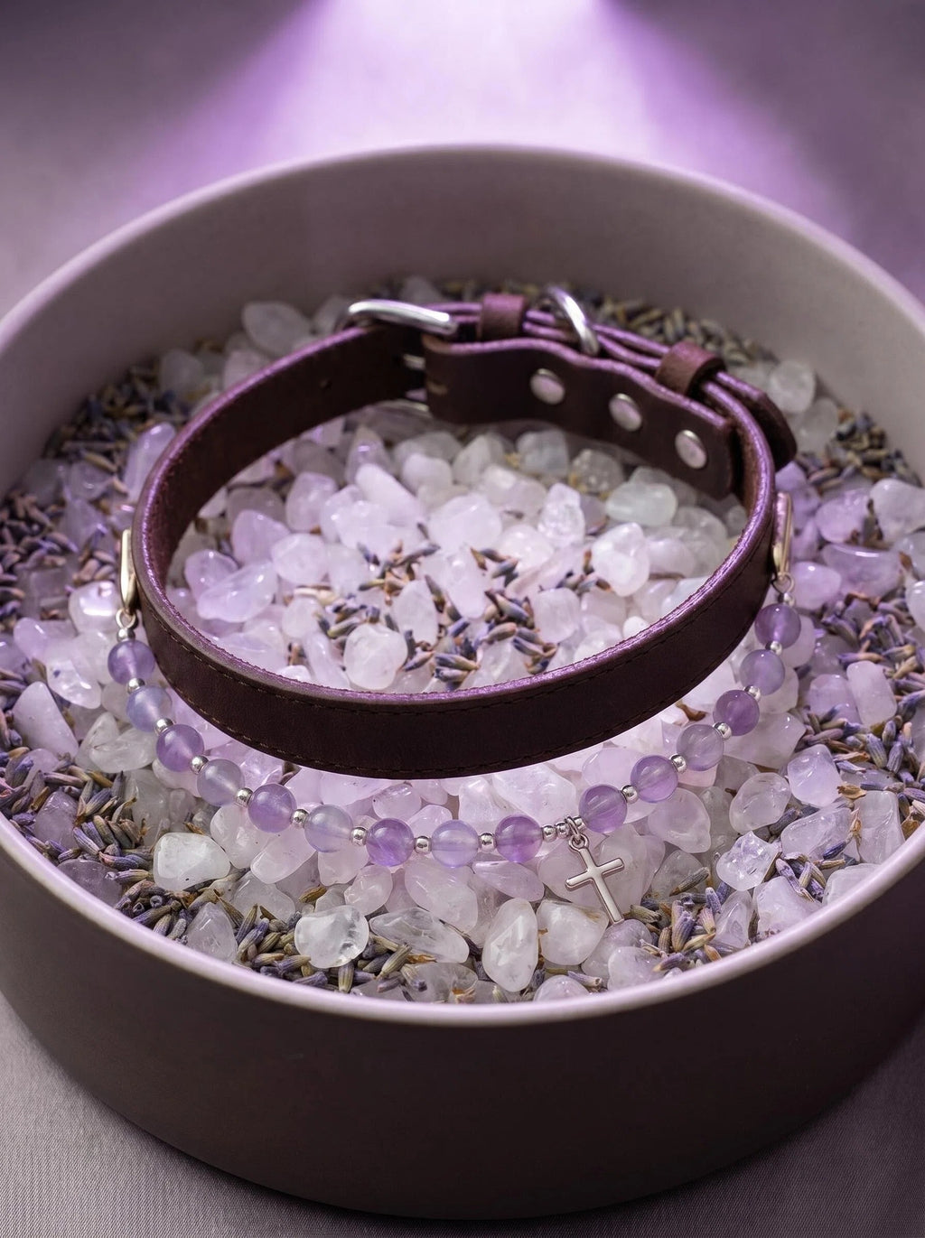 Sacred Light pet collar on selenite charging plate
with palo santo and lavender,
spiritual crystal pet collar cleansing ritual
purple and silver tones