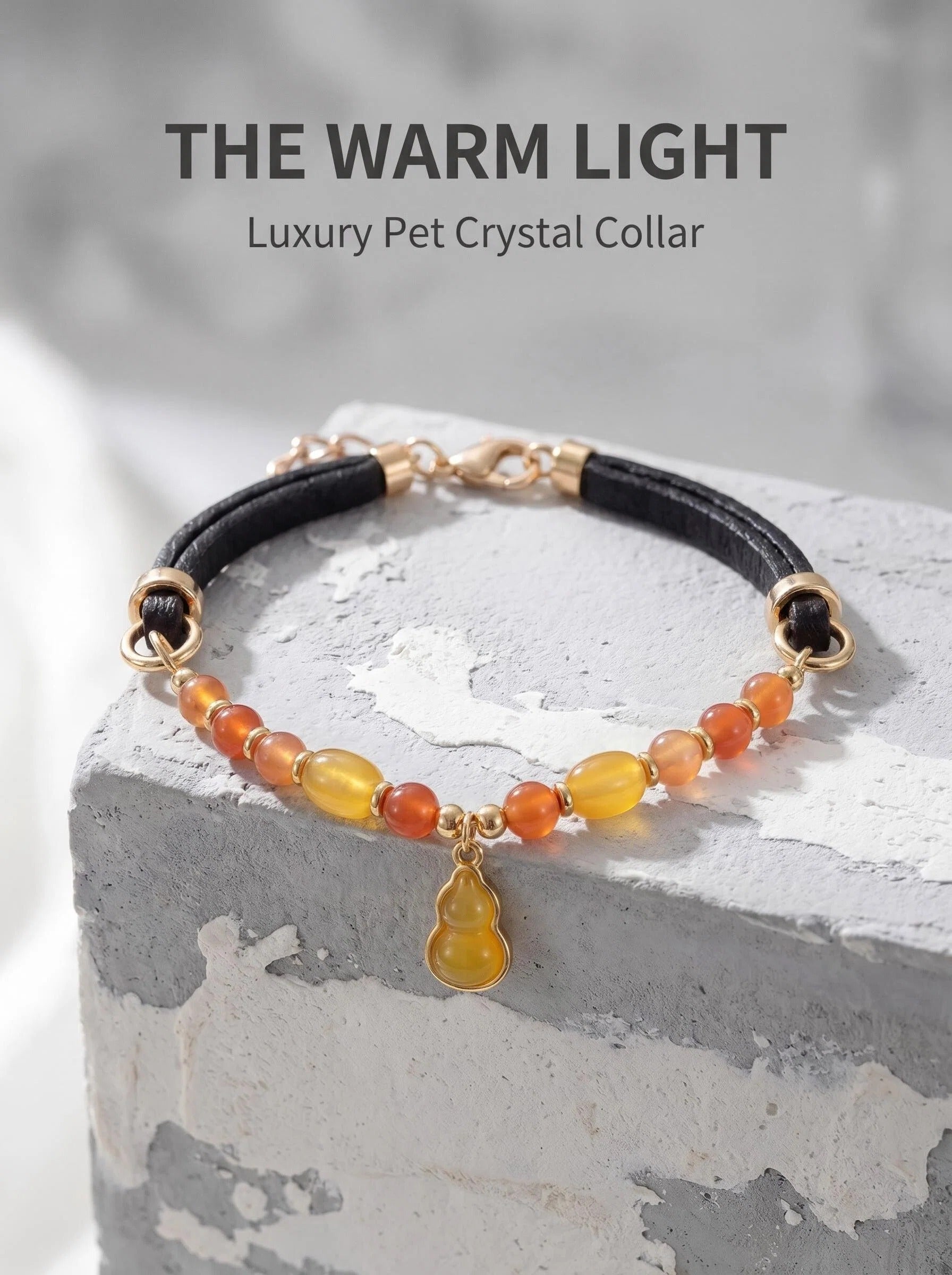 The Warm Light pet collar with strawberry quartz
orange moonstone and amber beads
on black leather cord with rose gold hardware,
luxury crystal collar for cats and small dogs